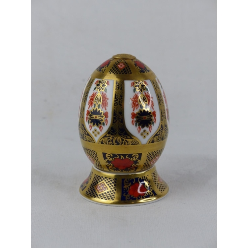 193 - A Royal Crown Derby 'Old Imari' egg on stand.