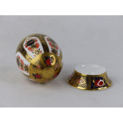 193 - A Royal Crown Derby 'Old Imari' egg on stand.