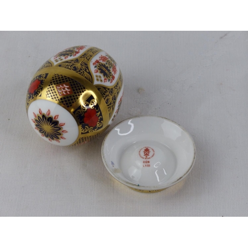193 - A Royal Crown Derby 'Old Imari' egg on stand.