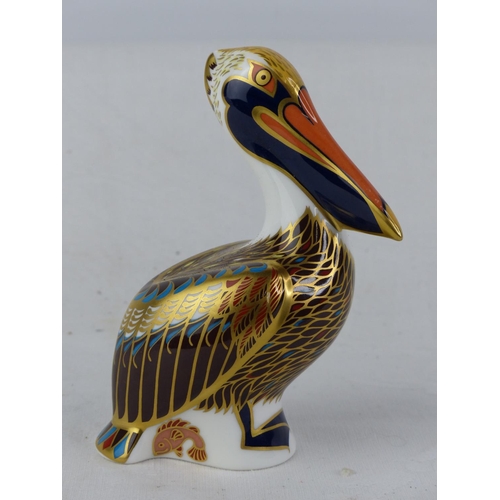 194 - A Royal Crown Derby 'Brown Pelican' paperweight, with gold stopper.