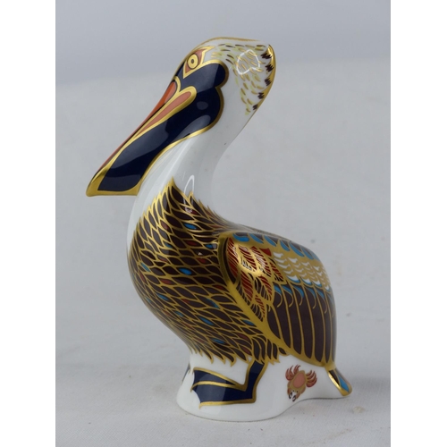 194 - A Royal Crown Derby 'Brown Pelican' paperweight, with gold stopper.
