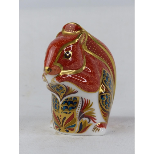 195 - A Royal Crown Derby squirrel paperweight, with gold stopper.