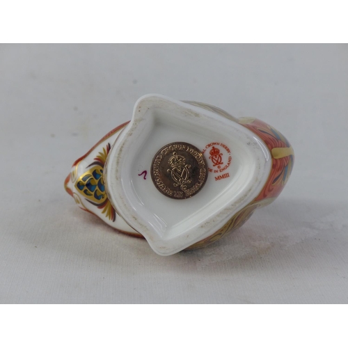 195 - A Royal Crown Derby squirrel paperweight, with gold stopper.