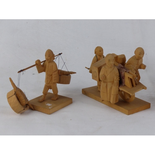 201 - A collection of vintage/ antique handmade wooden Chinese figures.
