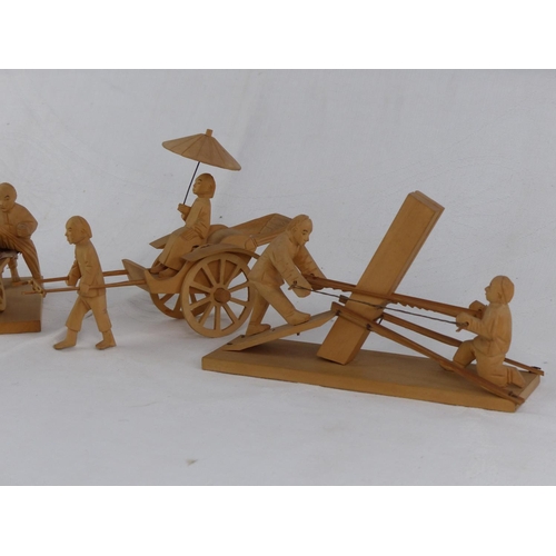 201 - A collection of vintage/ antique handmade wooden Chinese figures.