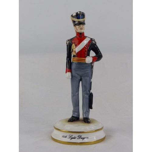 205 - A limited edition Michael Sutty hand painted porcelain figure '16th Light Dragon'.