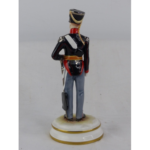 205 - A limited edition Michael Sutty hand painted porcelain figure '16th Light Dragon'.