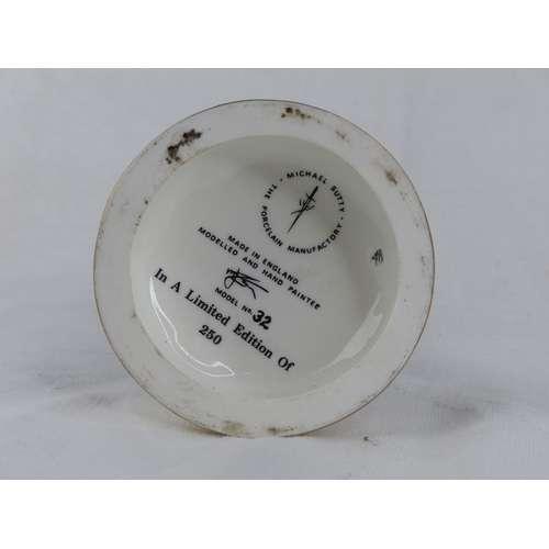 205 - A limited edition Michael Sutty hand painted porcelain figure '16th Light Dragon'.