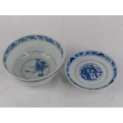 210 - A stunning decorative Chinese tea bowl and saucer, each signed to base.