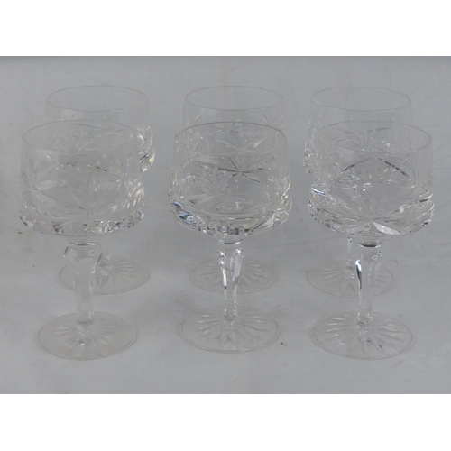 212 - A set of six cut glasses.