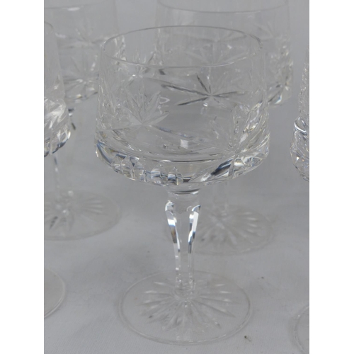 212 - A set of six cut glasses.