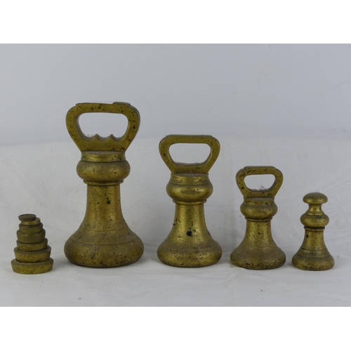 213 - A set of vintage brass butchers weights and more.