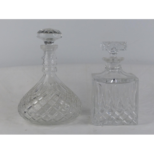 214 - Two cut glass decanters.