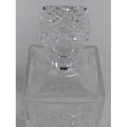 214 - Two cut glass decanters.