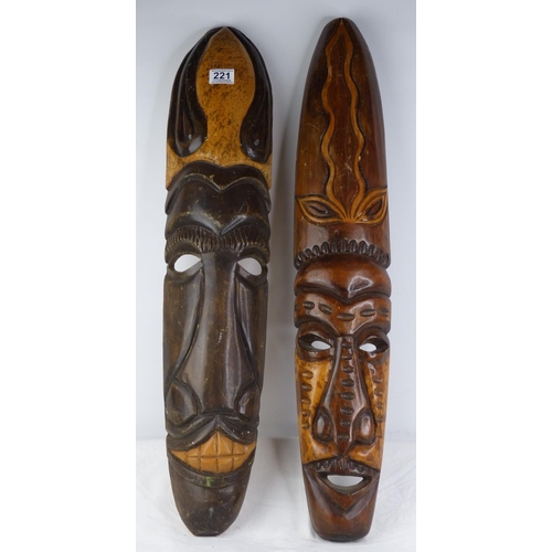 221 - Two carved wooden tribal wall masks.