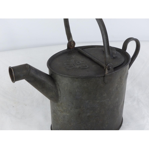 236 - An antique 'GR' watering can.