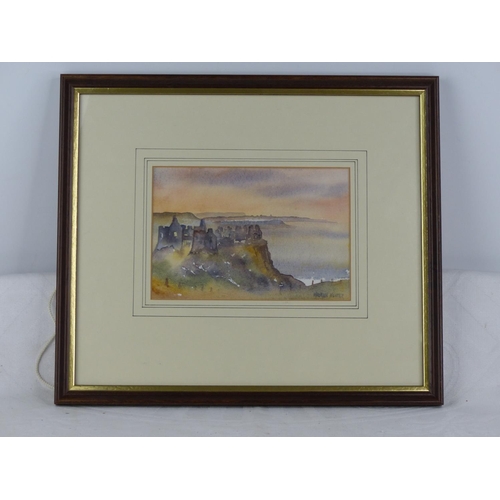 241 - A small framed watercolour 'Dunluce Castle' signed Maureen Hunter.