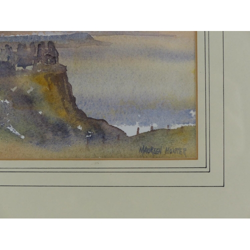 241 - A small framed watercolour 'Dunluce Castle' signed Maureen Hunter.