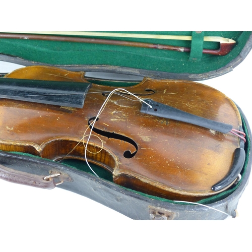 514 - An antique violin, in need of some tlc, complete with case & bow.