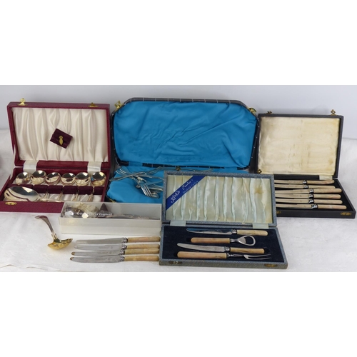 516 - A collection of vintage cased cutlery sets.