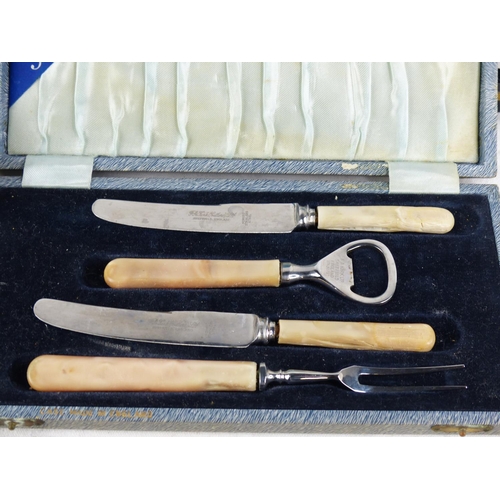 516 - A collection of vintage cased cutlery sets.