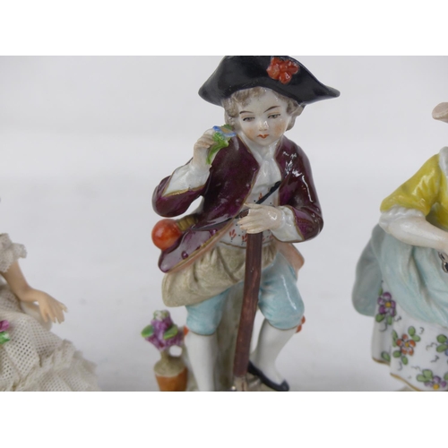 522 - A pair of antique Dresden Sitzendorf porcelain figurines and another (a/f).