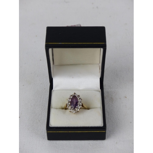 548 - A 9ct gold amethyst ring, size O.