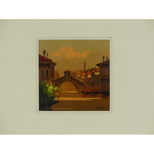 558 - A small framed oil painting of a continental scene, signed.