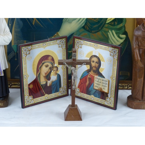 104 - A framed Religious picture, a wood and chalk religious figures and more.