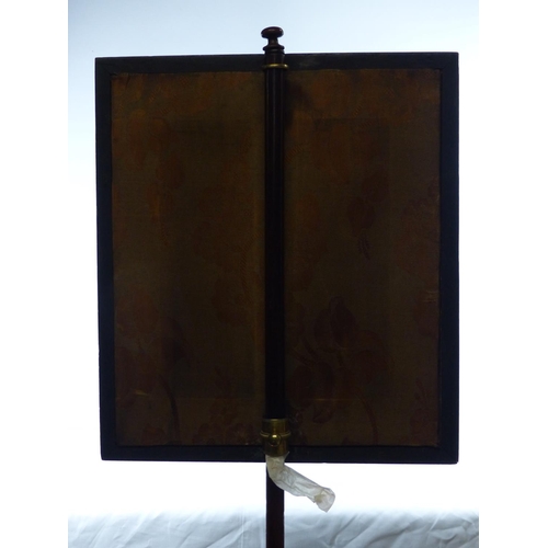 11 - An antique pole fire screen with tapestry detail, measuring 150cm x 41cm.