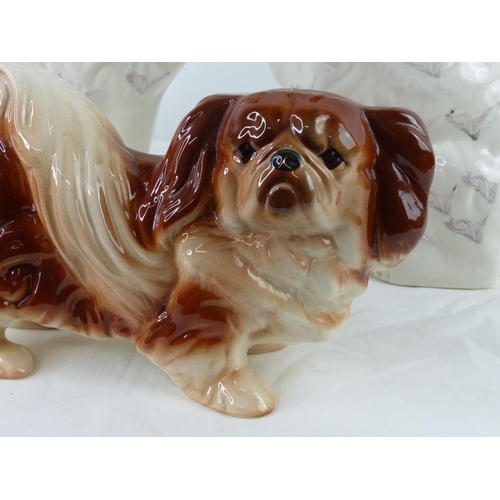 14 - A pair of antique Staffordshire mantle dogs and Melba Ware dog.