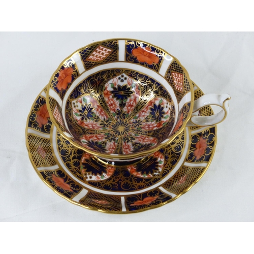 48 - A large Royal Crown Derby cup and saucer.