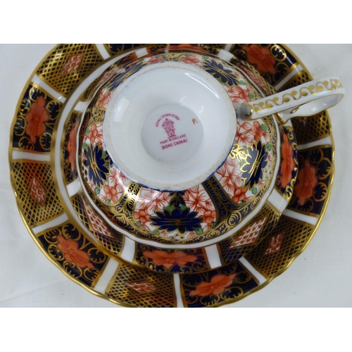 48 - A large Royal Crown Derby cup and saucer.