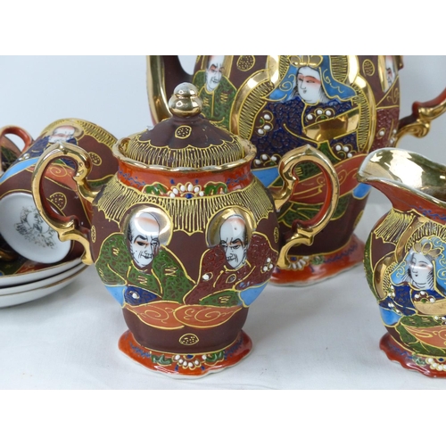 54 - A vintage Japanese hand painted tea set.