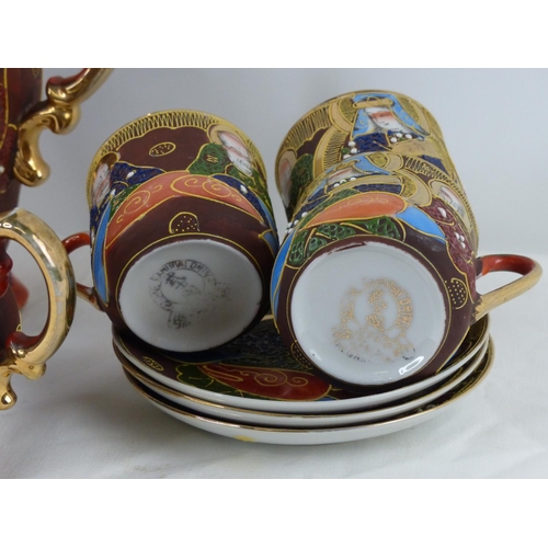 54 - A vintage Japanese hand painted tea set.