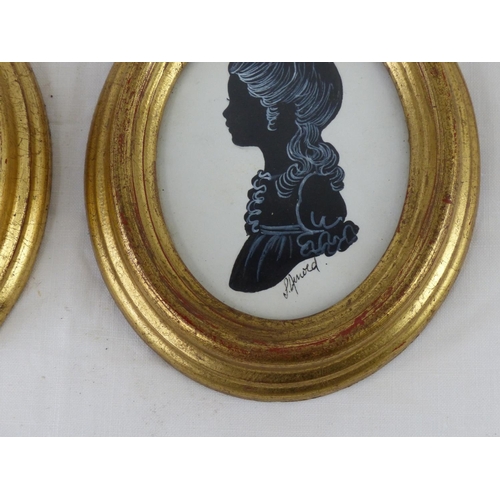 65 - A pair of gilt framed Phyllis Arnold silhouettes, measuring 12cm.