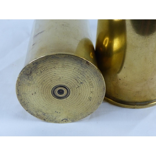 7 - Two vintage brass shell cases.