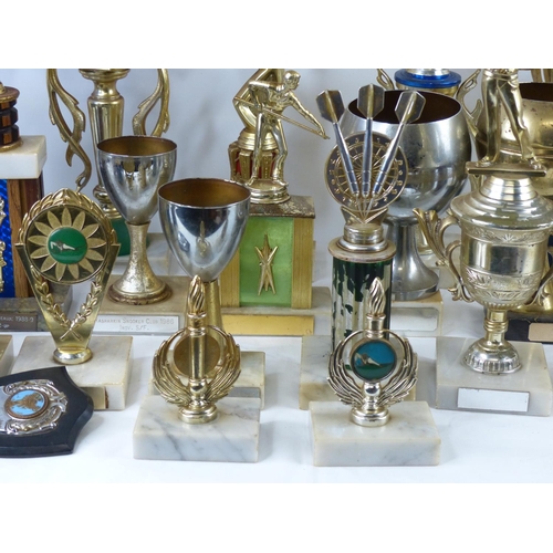 73 - A large collection of Darts trophy cups and plaques, to include Rasharkin, Garvagh and more.