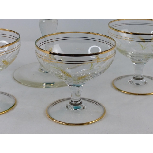 78 - A large vintage coloured glass vase and set of 4 champagne saucers.