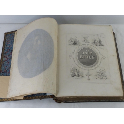 96 - A large Victorian family bible, measuring 32cm.