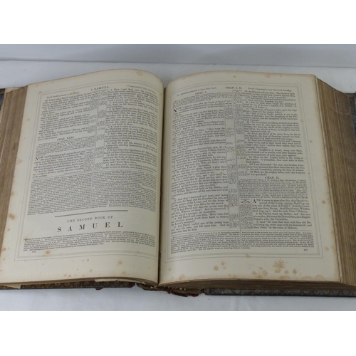 96 - A large Victorian family bible, measuring 32cm.