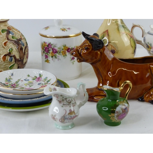 99 - A collection of ceramics to include Poole pottery, Royal Grafton, Aynsley Orchard Gold and more.