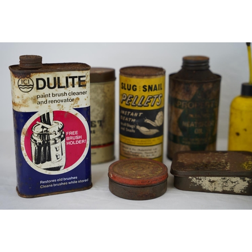 126 - A collection of vintage oil cans and more.