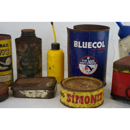 126 - A collection of vintage oil cans and more.