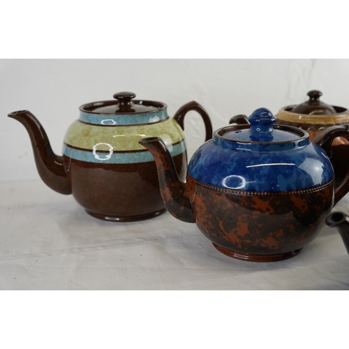 158 - Six 1940's patterned ceramic teapots.