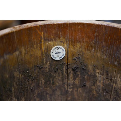 183 - An R A McLister & Co Ltd, Dursley barrel shaped planter, measuring 92cm.