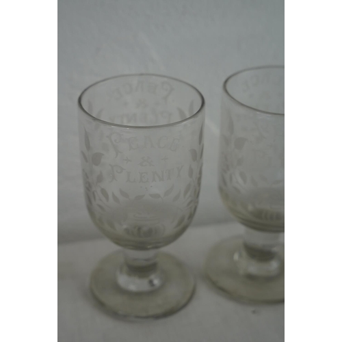 191 - A stunning pair of antique 'Peace & Plenty' glasses.