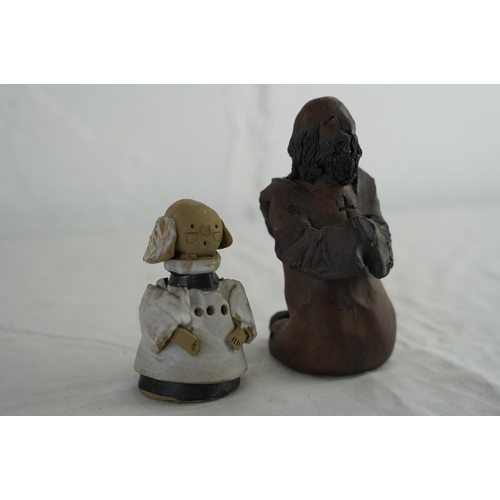 193 - Two studio pottery Religious figures.