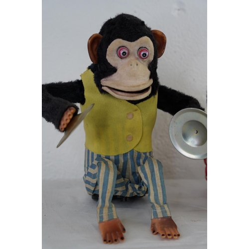 196 - Three vintage 'Cymbal Banging' monkeys, measuring 26cm.