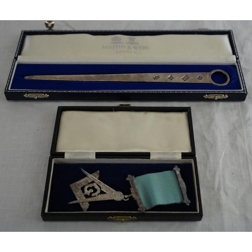 230 - A Sterling silver Masonic medal and a Sterling silver Mappin & Webb letter opener.